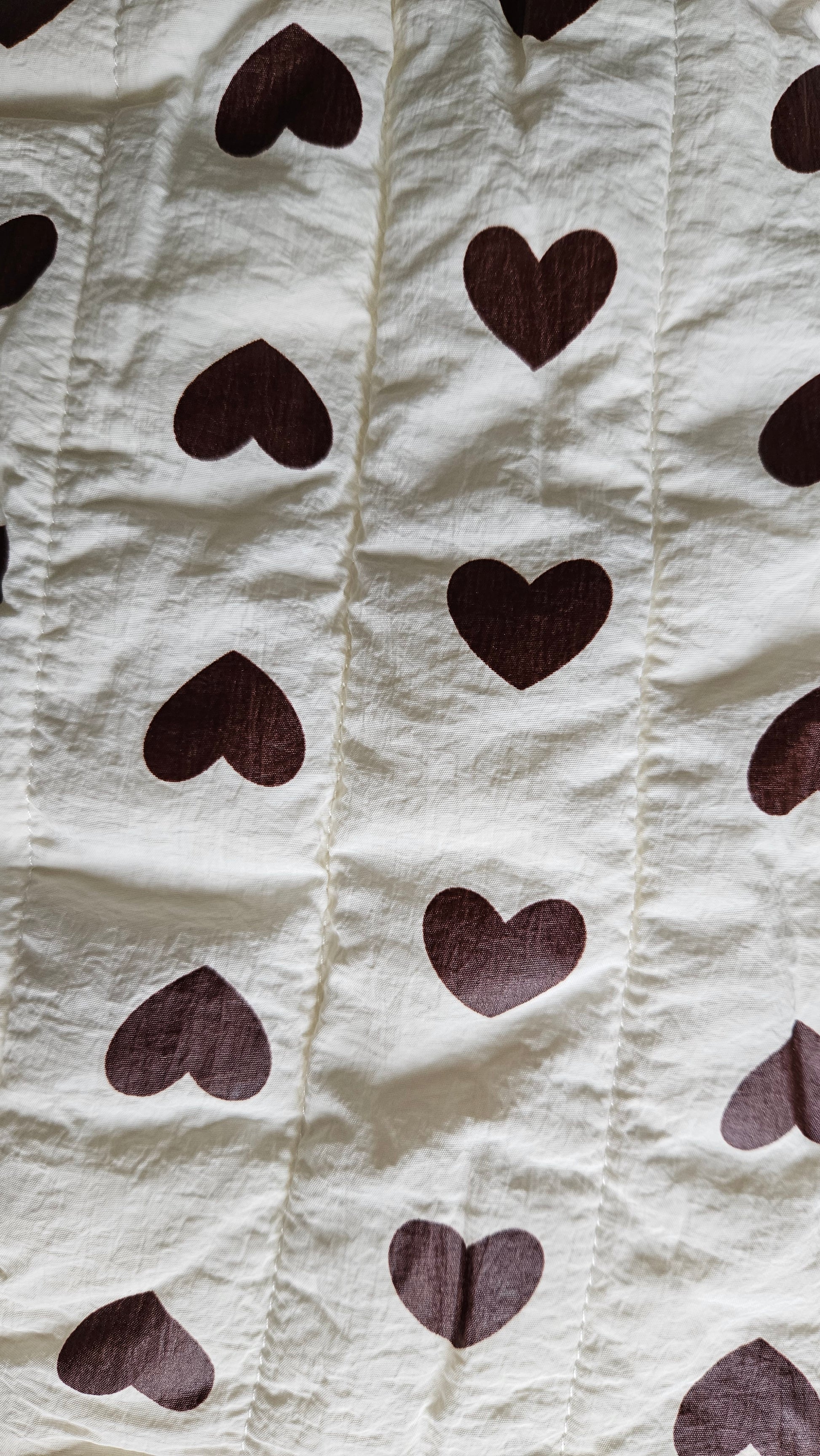 Combinaison pilote hiver bébé imperméable – Blanche à cœurs marron