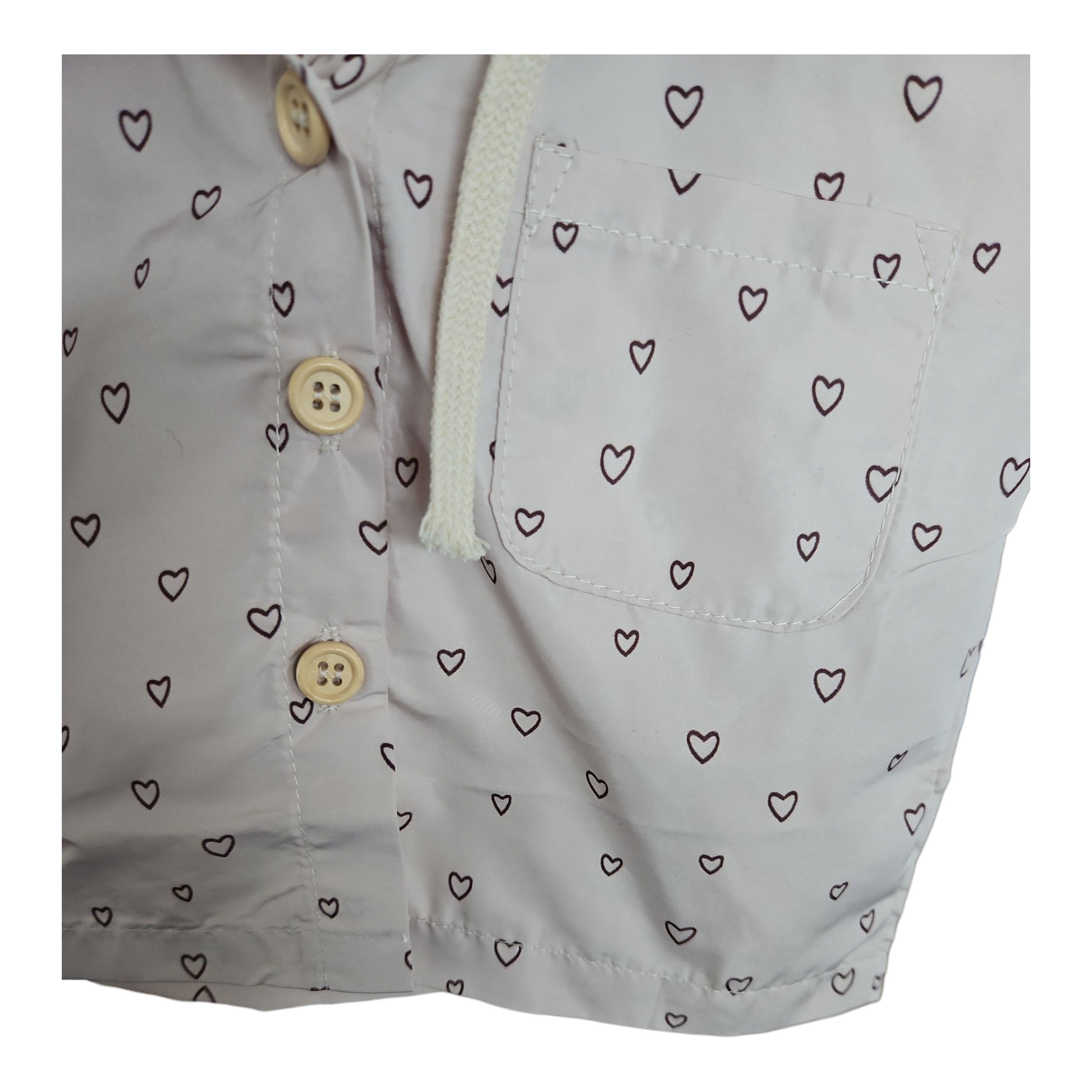 Imperméable fin bébé mixte – Beige à cœurs noirs – Capuche & boutons